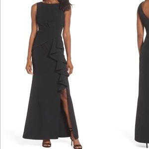 Voluminous ruffles cascade down the skirt